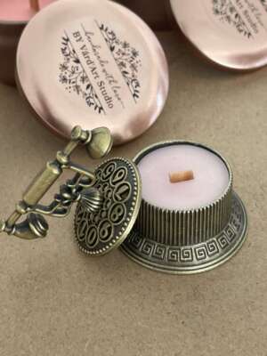 Természetes szúnyogriasztó gyertya kicsi fém telefonkagylóban, citronella illattal