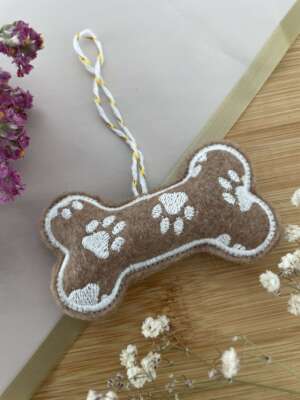 Kutyacsont formájú textil dísz